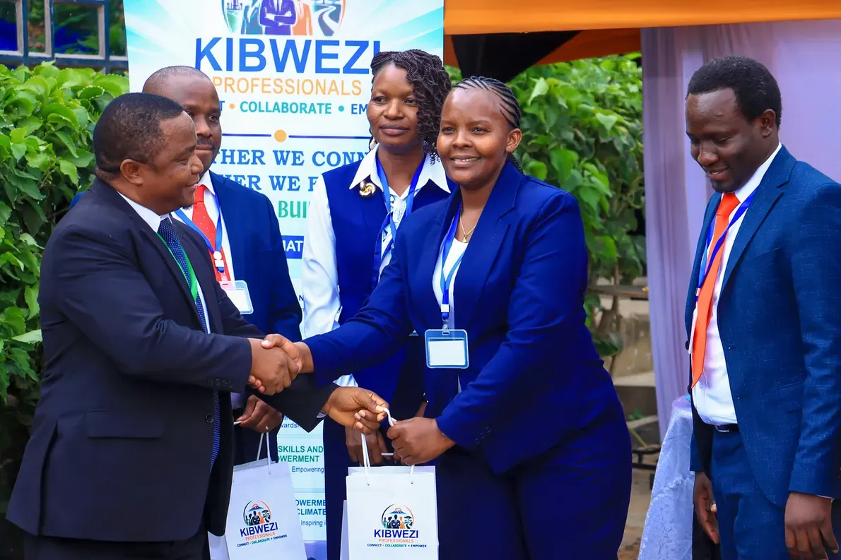 Members greeting one another at the public launch of KMUA