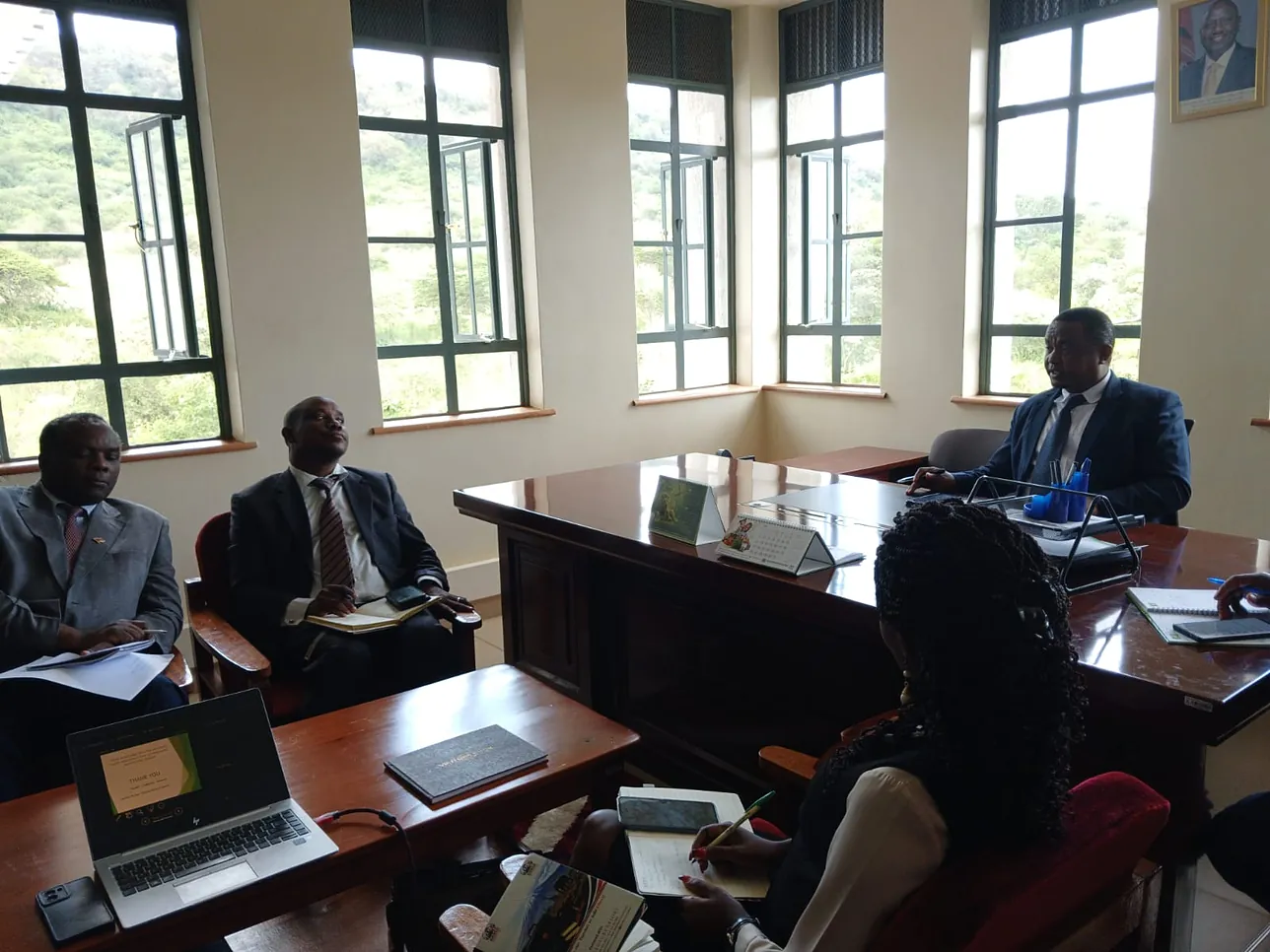 A working meeting during the courtesy call at Makueni University College