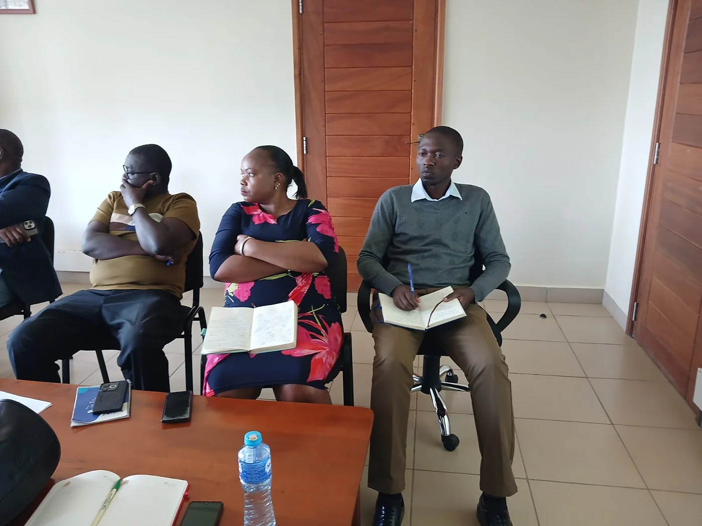 Members taking notes during the courtesy call at Makueni University College